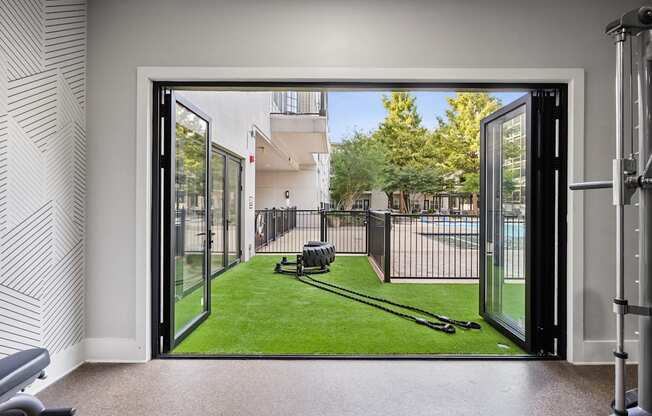 A view of a backyard through a glass door.