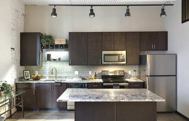 Open Concept Kitchen with Stainless Steel Appliances