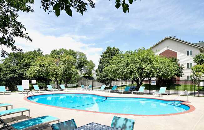 One- two- and three-bedroom apartment homes featuring amenities like three pools, fitness center, basketball court and much more at The Pointe in La Vista, NE