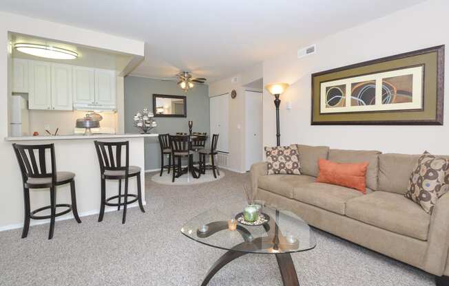 a living room with a couch and a table