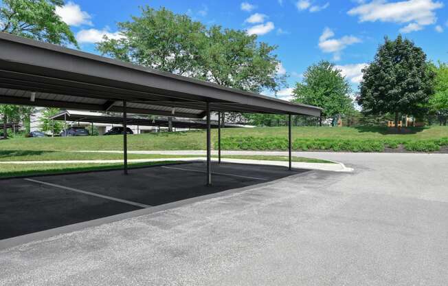 a parking lot with a canopy over it