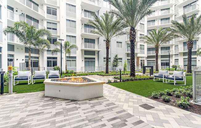 Courtyard with Fire Pits at The Marc Luxury Apartments in Palm Beach Gardens FL