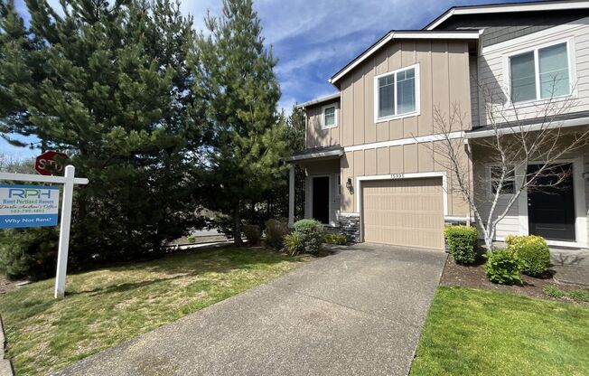 Stylish 3-Bedroom Bethany Residence with Open-Concept Living, Fenced Yard, and Attached Garage