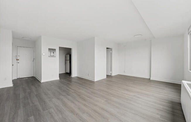 A Room With Light Wood Flooring at Ashlawn at Southern Towers, Virginia
