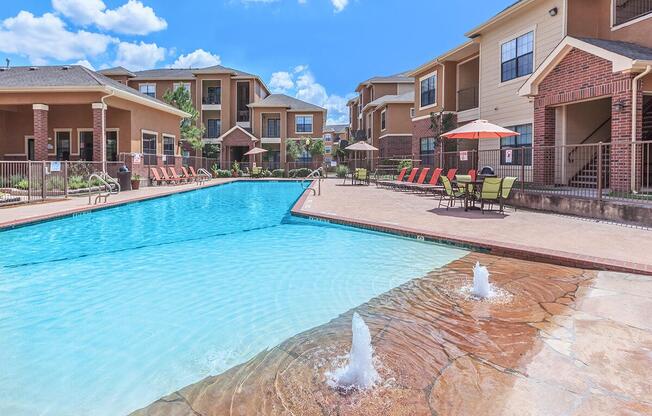 SOAK UP THE SUN BY THE SHIMMERING SWIMMING POOL