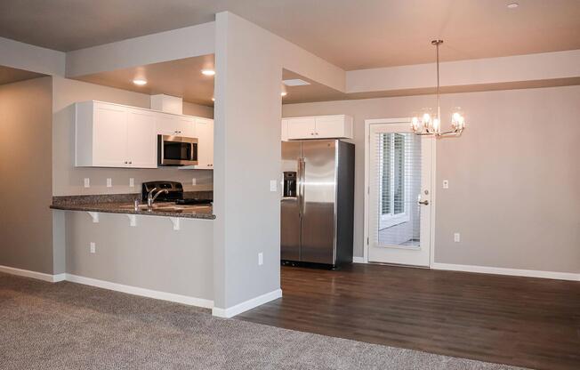 a kitchen with a large mirror