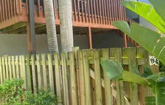 Great 2 bedroom 2 bath condo with screened balcony, private fenced courtyard and storage area
