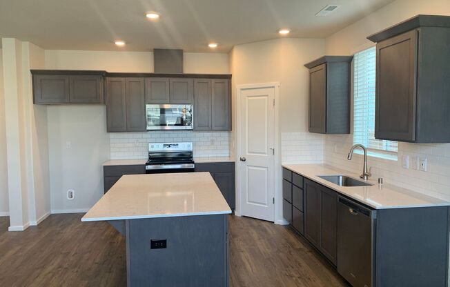 BRAND NEW 4 BED/2.5 BATH HOME! MOVE IN NOW! High End Finishes!  Beautiful Kitchen!