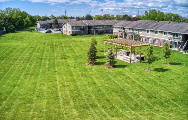 Lush Green Outdoor Spaces at Glen Hills Apartments, Glendale, WI