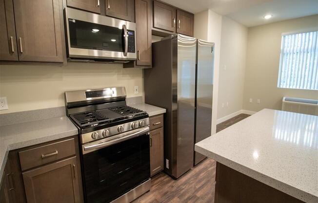 Fully Equipped Island Kitchen at Loma Villas Apartments, California, 92408