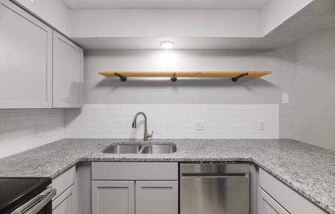 a kitchen with stainless steel appliances
