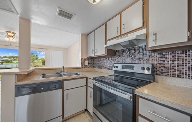 WATERFRONT LIVING IN SANDY COVE! | 1 BEDROOM, 1 BATH CONDO