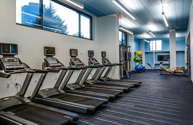 Fitness center with treadmills at The Graham at Southern Towers, Alexandria, Virginia