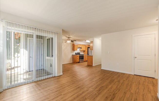 Cascade Woods living area with sliding glass door