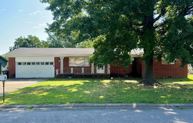 Beautiful 3 bedroom 1.5 bath brick home with 2 car garage