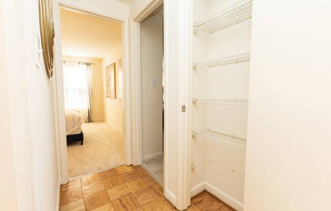 Upstairs hallway with ample storage at Spring Hill Apartments & Townhomes, Baltimore Maryland
