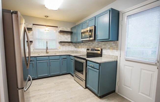 Available Early July! Renovated 3 bedroom Duplex close to Duke!