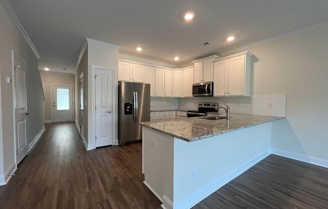 Stunning 3BD, 2.5BA Raleigh Townhome in a Prime Location with Easy Access to Shopping and Dining