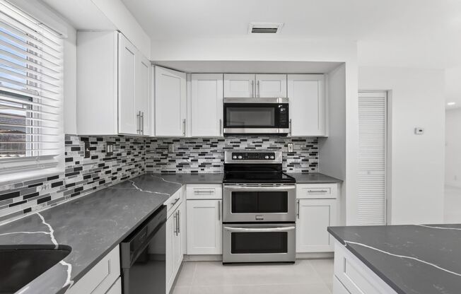 Renovated 3BR/2BA Corner Single-Family Home – Large Fenced Yard, NO HOA