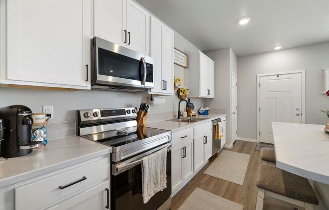 Beautiful 3-Bedroom Townhome with Park Views- Available NOW!