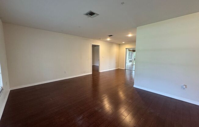 Eustis Lake Front Home with 2 Primary Bedrooms!
