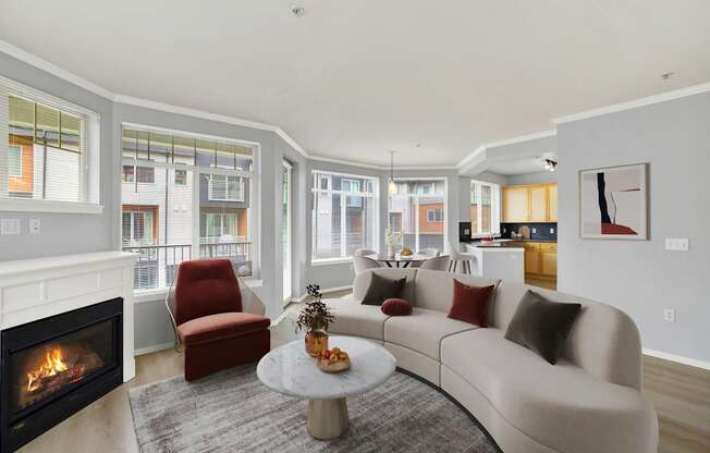 A modern living room with a fireplace and a couch.
