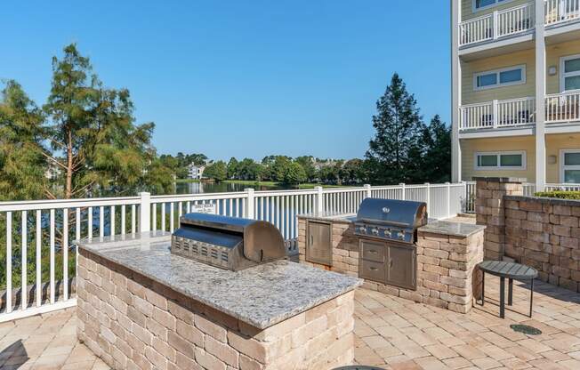 the preserve at ballantyne commons spacious outdoor patio with barbecue grill and seating area
