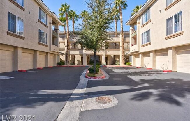 DOWNSTAIRS 2 BEDROOM CONDO IN GUARD GATED COMMUNITY!