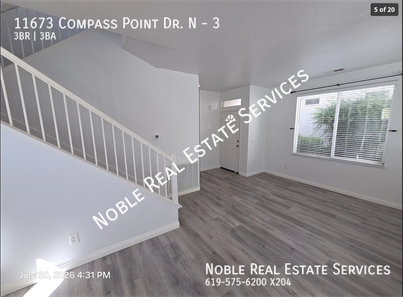 11673 COMPASS PT DR N