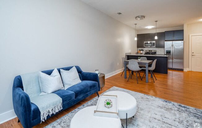a living room with a couch and a table