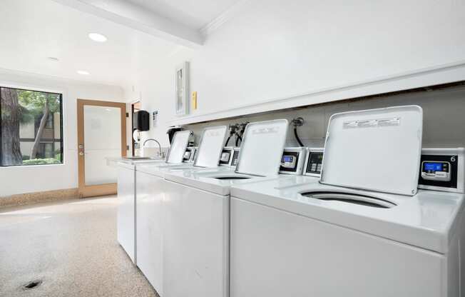 the laundry room is equipped with washes and dryers