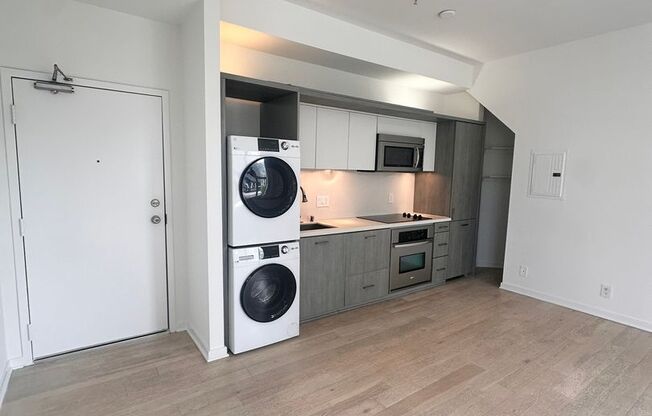 DOWNTOWN GEM | Modern Two-Level Loft with Private Patio & Rooftop Deck
