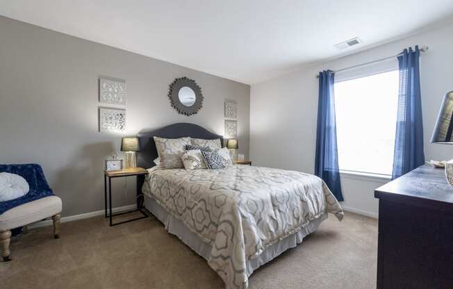 Spacious primary bedroom in a 2 bedroom apartment at University Park Apartments