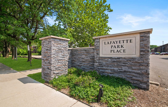 Stone wall with a Property Sign at Lafayette Park Place, Detroit, MI, Michigan, 48207