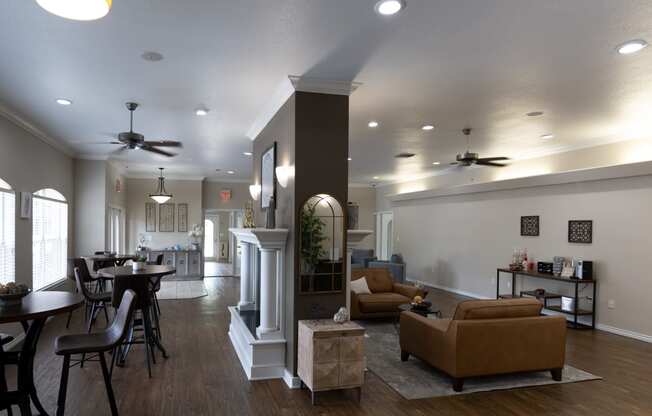 View of clubroom with seating, well decorated, and coffee bar.