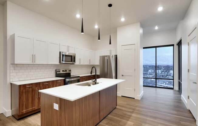 The Stack - Sugarhouse Apartments Kitchen with Floor to Ceiling Windows