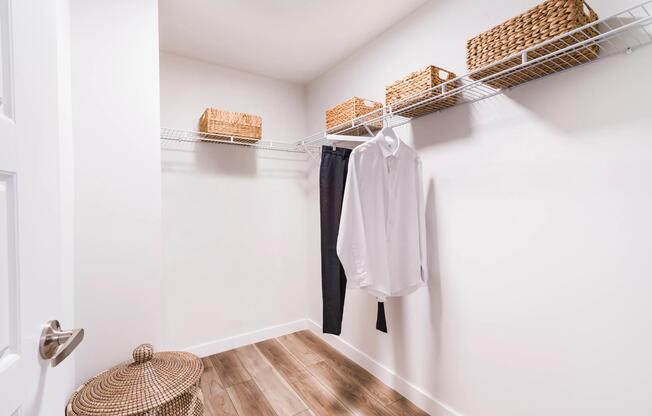 A spacious closet at Modera Aventura with open shelving and clean lines, offering an organized, streamlined space that supports everyday living.