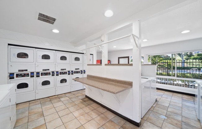 the laundry room is equipped with washes and dryers