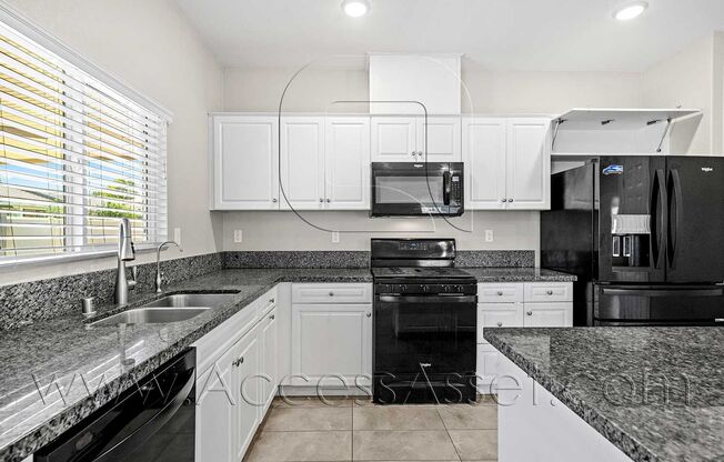 Partially furnished 4 Bed/2 Bath Plus a Bonus Room Updated Ranch-Style Home in the Heart of Hidden Hills!