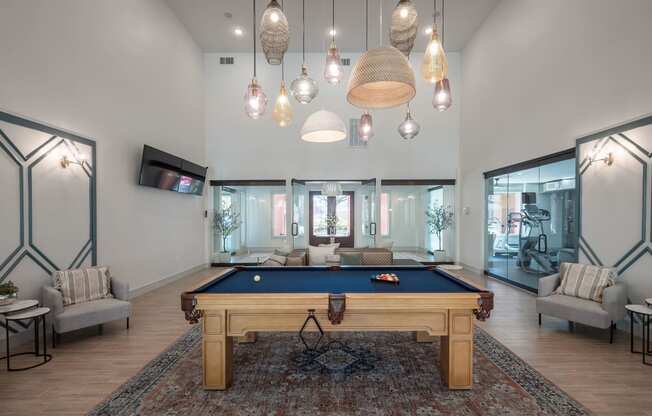 a pool table in the middle of a living room