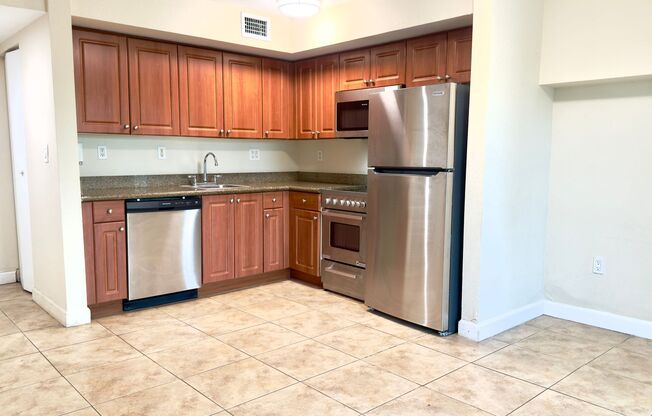 Beachside One Bedroom Condo with Parking and In Unit Laundry