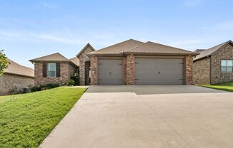 Come home to this stunning 4 bed/2 bath split floorplan home in Centerton!