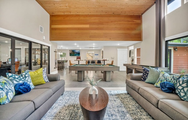 a living room with couches and a pool table at Sunset Ridge, Texas