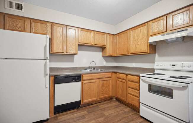 the preserve at ballantyne commons apartment kitchen with white appliances
