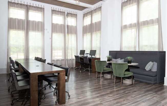 a conference room with a table and chairs