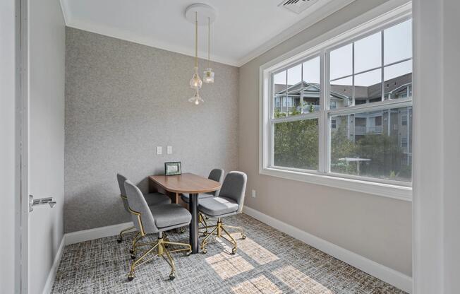 Private meeting room with natural light, comfortable seating, and a dedicated setting for team discussions, planning sessions, and focused collaboration.