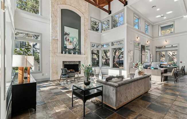 A living room with a fireplace and a couch.