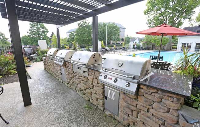 bbq grills at the enclave at woodbridge apartments in sugar land, tx