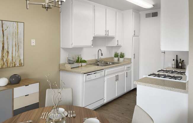 a kitchen and dining area in a 555 waverly unit