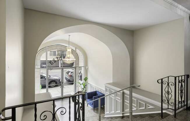 Property Entrance Stairs with Decorative Iron Railing at Charbern Apartment Homes, Seattle, WA, 98122